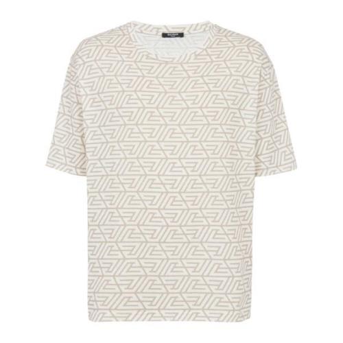 Balmain Oversized bomull T-shirt med tryckt pyramid monogram Beige, He...