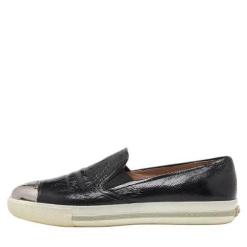 Miu Miu Pre-owned Pre-owned Laeder sneakers Black, Dam