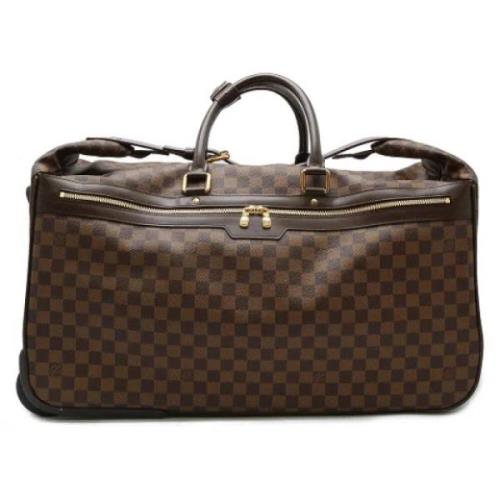 Louis Vuitton Vintage Pre-owned Tyg resvskor Brown, Dam