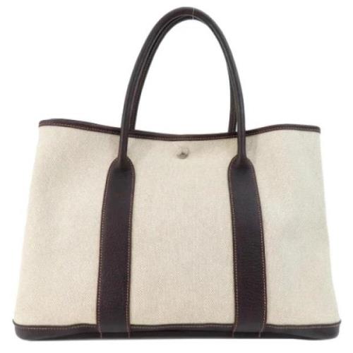 Hermès Vintage Pre-owned Tyg handvskor Beige, Dam