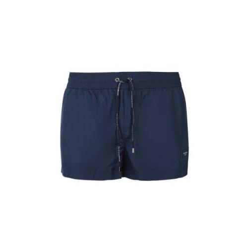 Dolce & Gabbana Marinblåa Strandshorts med Elastisk Midja och Logoplat...