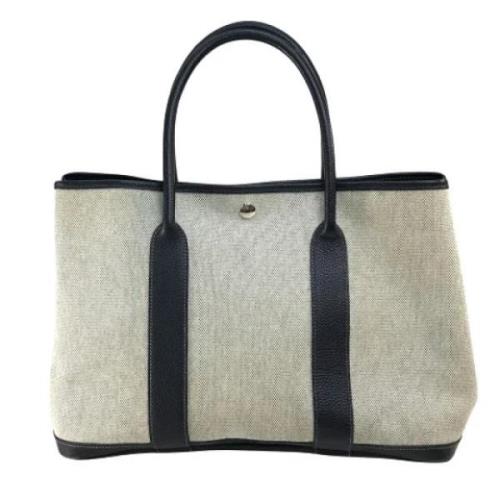 Hermès Vintage Pre-owned Canvas handvskor Gray, Dam