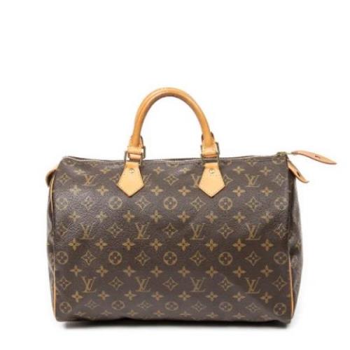 Louis Vuitton Vintage Pre-owned Belagd canvas handvskor Brown, Dam