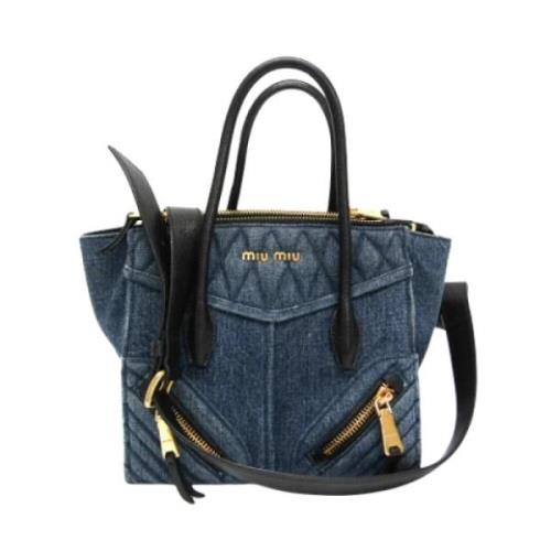 Miu Miu Pre-owned Pre-owned Denim handvskor Blue, Dam