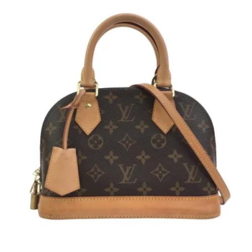 Louis Vuitton Vintage Pre-owned Canvas handvskor Brown, Dam