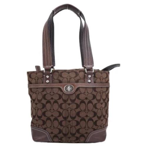 Coach Pre-owned Pre-owned Belagd canvas axelremsvskor Brown, Dam