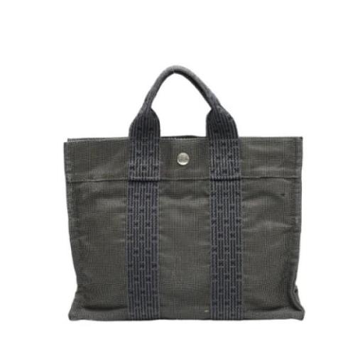 Hermès Vintage Pre-owned Canvas handvskor Gray, Dam