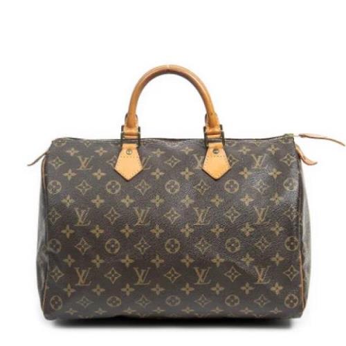 Louis Vuitton Vintage Pre-owned Belagd canvas handvskor Brown, Dam