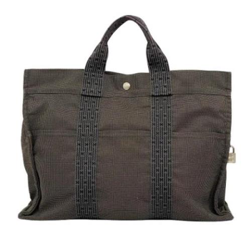 Hermès Vintage Pre-owned Canvas handvskor Gray, Dam