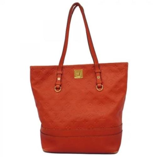 Louis Vuitton Vintage Pre-owned Tyg totevskor Orange, Dam