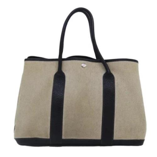 Hermès Vintage Pre-owned Canvas handvskor Beige, Dam