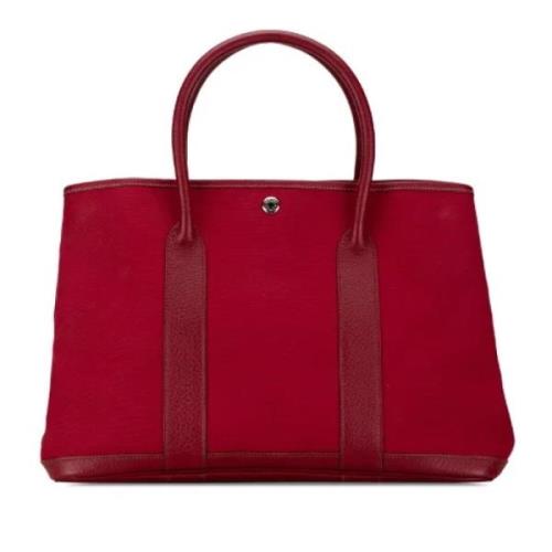 Hermès Vintage Pre-owned Canvas handvskor Red, Dam