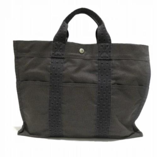 Hermès Vintage Pre-owned Canvas handvskor Gray, Dam