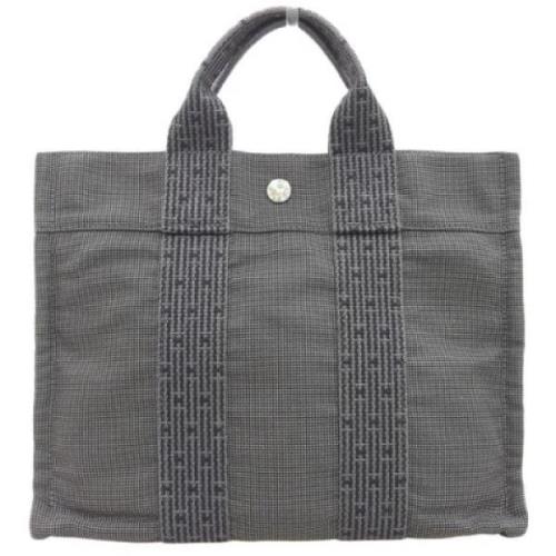 Hermès Vintage Pre-owned Canvas handvskor Gray, Dam