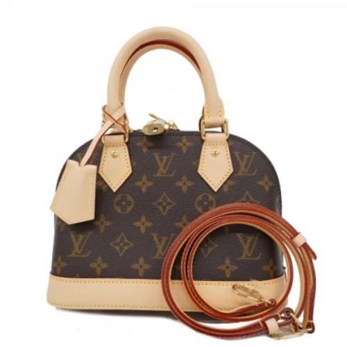 Louis Vuitton Vintage Pre-owned Tyg handvskor Brown, Dam