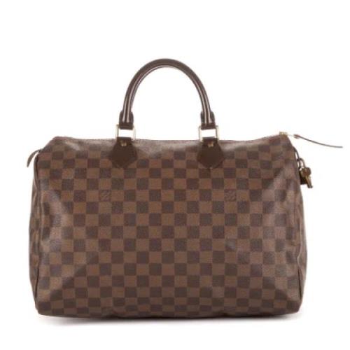 Louis Vuitton Vintage Pre-owned Belagd canvas handvskor Brown, Dam