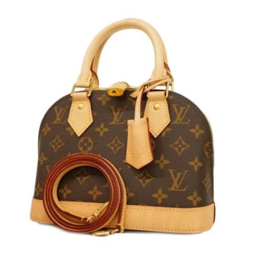 Louis Vuitton Vintage Pre-owned Tyg handvskor Brown, Dam