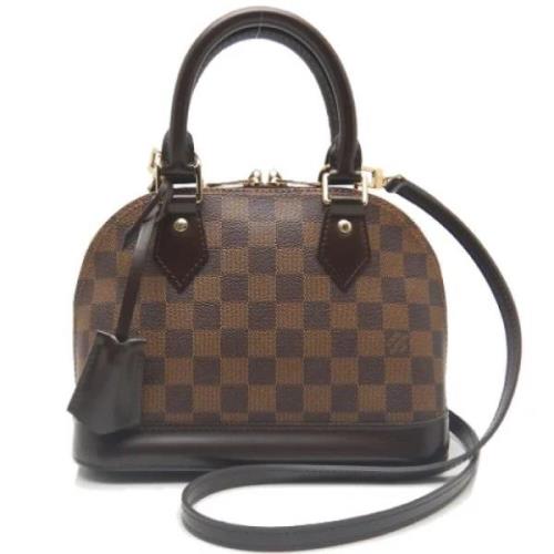 Louis Vuitton Vintage Pre-owned Canvas handvskor Brown, Dam