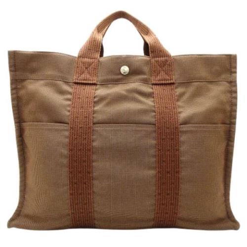 Hermès Vintage Pre-owned Canvas handvskor Brown, Dam