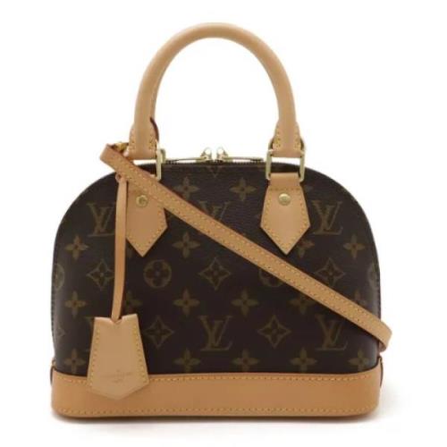 Louis Vuitton Vintage Pre-owned Canvas handvskor Brown, Dam