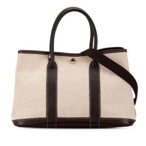 Hermès Vintage Pre-owned Canvas handvskor Beige, Dam