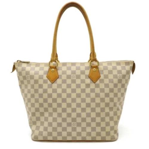 Louis Vuitton Vintage Pre-owned Plast handvskor Beige, Dam