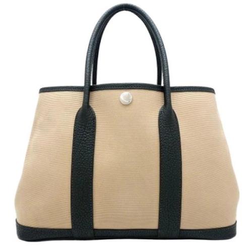 Hermès Vintage Pre-owned Canvas handvskor Beige, Dam