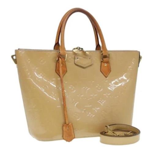 Louis Vuitton Vintage Pre-owned Laeder handvskor Beige, Dam