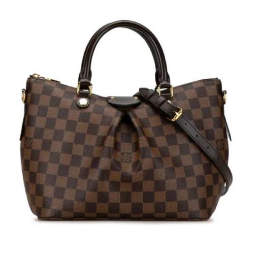 Louis Vuitton Vintage Pre-owned Canvas handvskor Brown, Dam