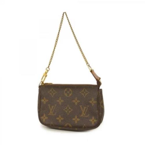 Louis Vuitton Vintage Pre-owned Tyg kuvertvskor Brown, Dam