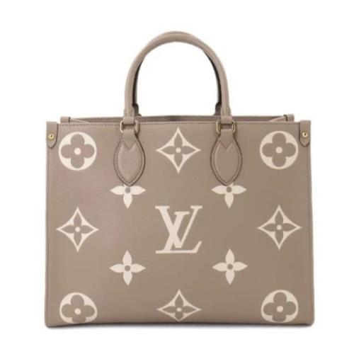 Louis Vuitton Vintage Pre-owned Tyg handvskor Beige, Dam