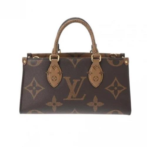 Louis Vuitton Vintage Pre-owned Canvas handvskor Brown, Dam