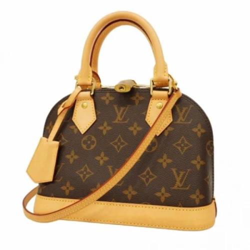 Louis Vuitton Vintage Pre-owned Tyg handvskor Brown, Dam