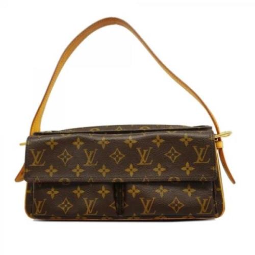 Louis Vuitton Vintage Pre-owned Tyg axelremsvskor Brown, Dam