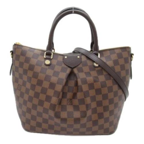 Louis Vuitton Vintage Pre-owned Tyg handvskor Brown, Dam