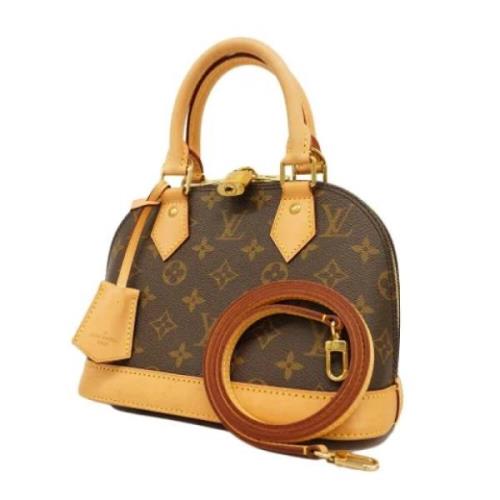 Louis Vuitton Vintage Pre-owned Tyg handvskor Brown, Dam