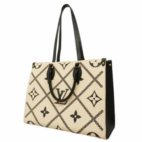 Louis Vuitton Vintage Pre-owned Tyg totevskor Beige, Dam