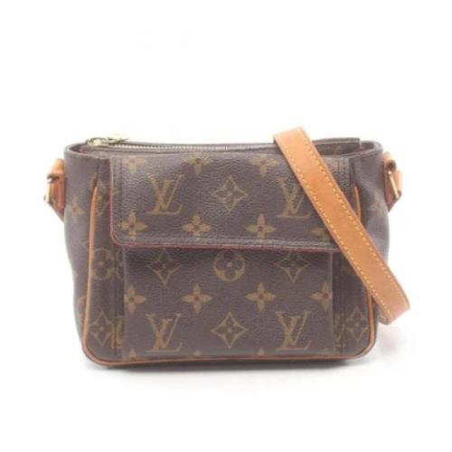 Louis Vuitton Vintage Pre-owned Canvas axelremsvskor Brown, Dam