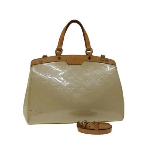 Louis Vuitton Vintage Pre-owned Laeder handvskor Beige, Dam