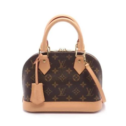 Louis Vuitton Vintage Pre-owned Canvas handvskor Brown, Dam