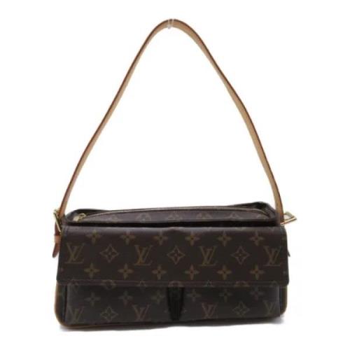 Louis Vuitton Vintage Pre-owned Canvas axelremsvskor Brown, Dam