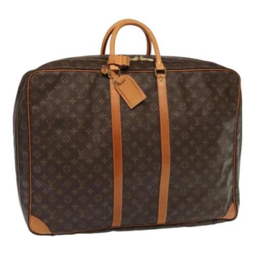 Louis Vuitton Vintage Pre-owned Canvas resvskor Brown, Dam