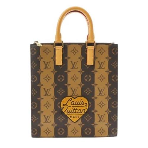 Louis Vuitton Vintage Pre-owned Canvas handvskor Brown, Dam