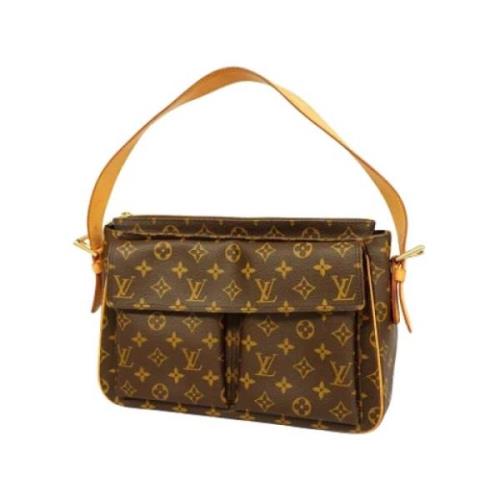 Louis Vuitton Vintage Pre-owned Canvas axelremsvskor Brown, Dam