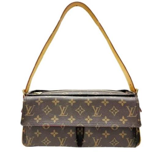 Louis Vuitton Vintage Pre-owned Canvas axelremsvskor Brown, Dam